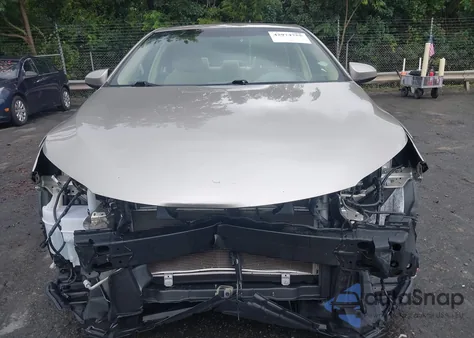 2015 Toyota Camry Hybrid Le from USA, damaged, VIN 4T1BD1FK9FU146986